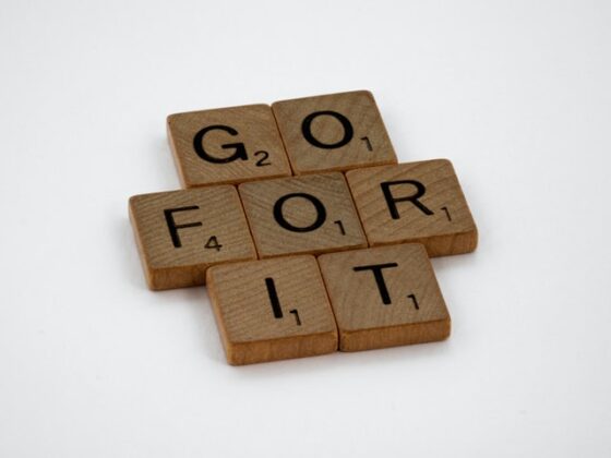 Photo of scrabble letters arranged to spell "Go For It". This image is meant to communicate encouragement in relation to registering for a walking club or other offering. 