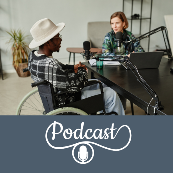 Image includes a photo of a Caucasian woman and African American man both wearing flannel and sitting at a black table with tech equipment including a microphone. The man is wearing a white cowboy hat and sitting in a wheelchair. The background is a modern office. Beneath the picture is a gray rectangle with a graphic microphone and the word podcast in fancy cursive