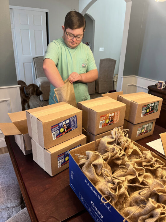 Photo of Max packing shipment boxes of Max Mix Spice Blends 